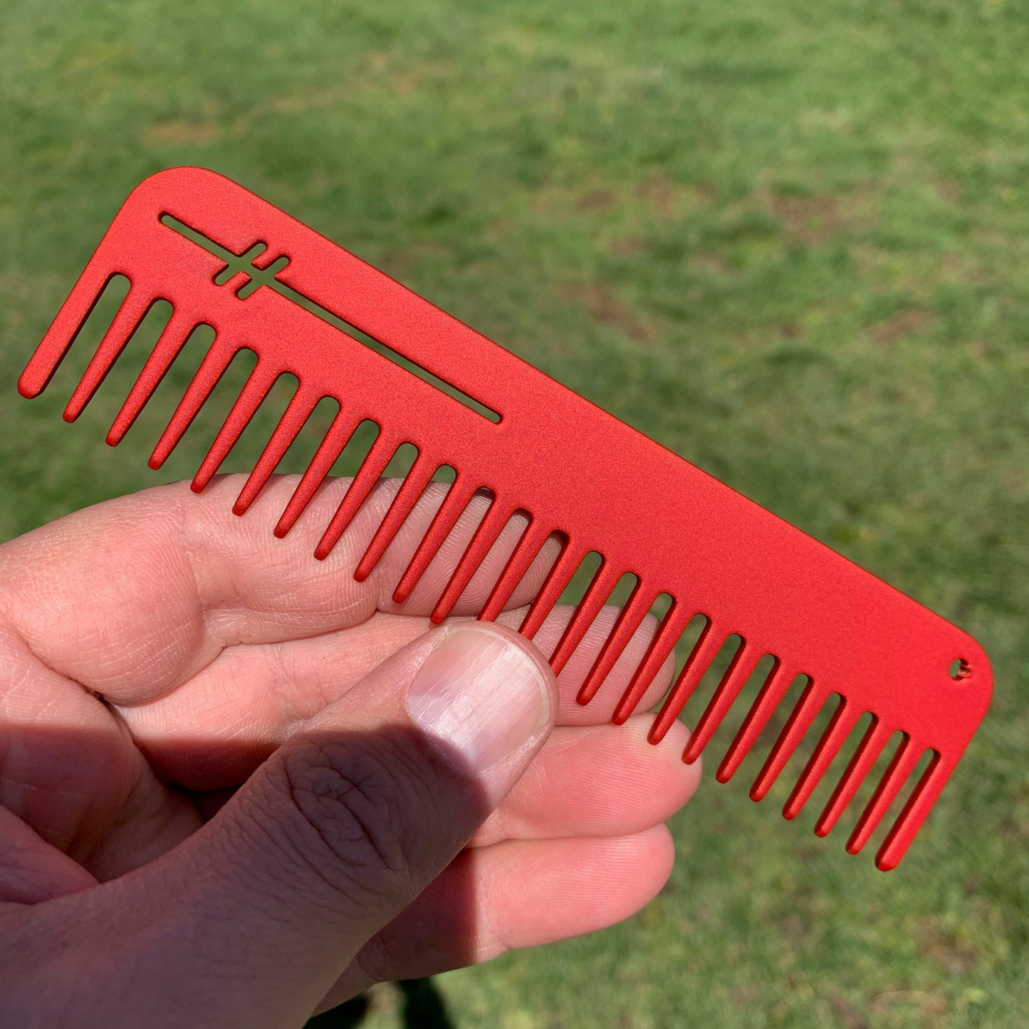 Heircomb Abbey Wide Tooth Metal Comb in Matte Red finish.